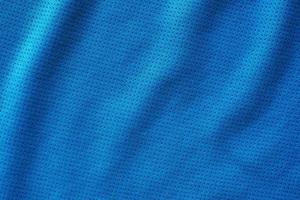 blauer stoff sportbekleidung fußball trikot mit air mesh textur hintergrund foto