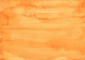 Aquarell orange Hintergrundtextur. aquarell karottenfarbhintergrund. Flecken auf Papier. foto