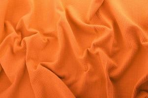 orange Stoff als Hintergrund