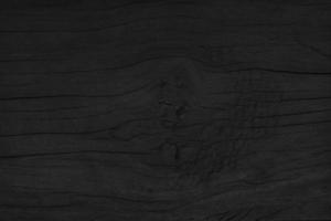 Holz schwarzer Tischhintergrund. dunkle obere Textur leer für Design foto