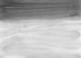 aquarell schwarz-weiß hintergrundtextur. Pinselstriche auf Papier. foto