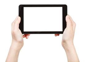hände halten tablet-pc mit ausgeschnittenem bildschirm foto
