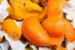 Schalen von Orangen und Mandarinen hautnah foto