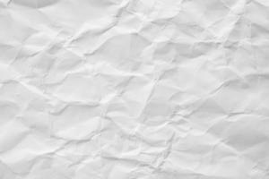 abstrakter weißer zerknitterter papierbeschaffenheitshintergrund foto