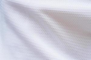 weißer fußball trikot kleidung stoff textur sportbekleidung hintergrund foto