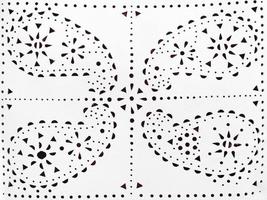 Perforiertes Paisley-Muster auf weißem Leder foto