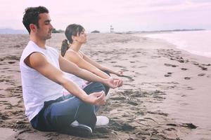 paar yoga strand foto
