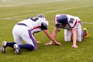 professionelles American-Football-Spieler-Training foto