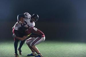 American-Football-Spieler in Aktion foto