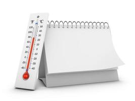 Thermometer und Kalender foto