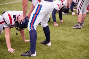 professionelles American-Football-Spieler-Training foto