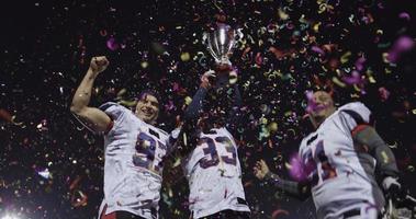 American-Football-Team feiert den Sieg foto