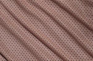 textur von sportbekleidung aus polyesterfasern. Oberbekleidung für das Sporttraining hat eine Maschenstruktur aus dehnbarem Nylongewebe foto
