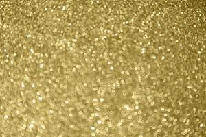 abstrakter goldglitter funkeln bokeh heller hintergrund foto