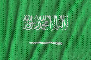 Saudi-Arabien-Flagge gedruckt auf einem Sportbekleidungsnetz aus Polyester-Nylon f foto