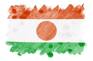 niger-flagge ist in flüssiger aquarellart dargestellt, die auf weißem hintergrund lokalisiert wird foto