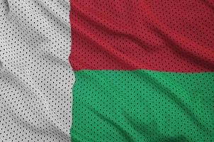 Madagaskar-Flagge gedruckt auf einem Polyester-Nylon-Sportswear-Mesh-Gewebe foto