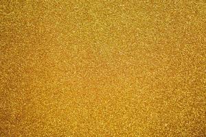 abstrakter goldglitter funkeln textur hintergrund foto