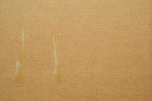 brauner öko-recycelter kartonpapierblatt-texturhintergrund foto