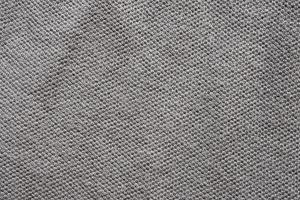 grauer Baumwollhemdgewebe-Texturhintergrund foto