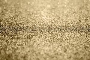 abstrakter goldglitter funkeln textur hintergrund foto