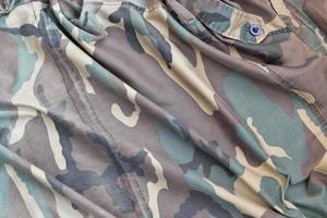 Camouflage-Hintergrundtextur als Hintergrund für Militärdienst-Designprojekte foto