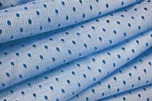 blaues Mesh-Sportbekleidungsstoff-Textil-Hintergrundmuster foto