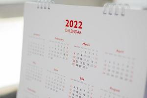 Nahaufnahme 2022 Kalenderseite Daten und Monat Hintergrund Geschäftsplanung Termin Besprechungskonzept foto
