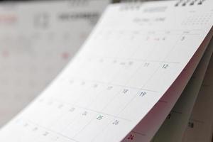 abstrakte Unschärfe Kalenderseite Fliping Sheet Nahaufnahme Hintergrund Business Zeitplan Planung Termin Meeting-Konzept foto