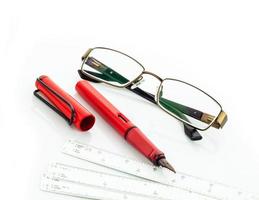 Brillenstift und Lineal foto