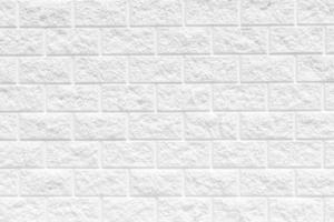 weißer Backsteinmauermusterhintergrund für Kopienraum und -beschaffenheit foto