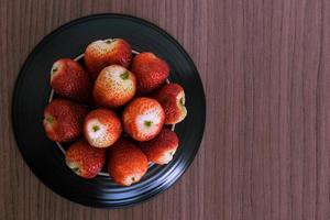 Schüssel Erdbeeren foto