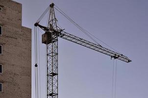 Gebäude im Bau mit Kran foto