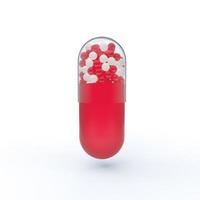 rote Kapseltablette mit roten und weißen Bruchstücken im Inneren. 3D-Darstellung einer Pille. foto