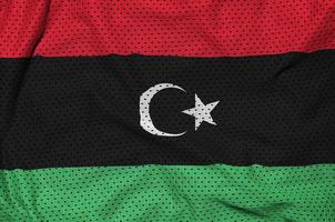 Libyen-Flagge gedruckt auf einem Polyester-Nylon-Sportswear-Mesh-Gewebe m foto