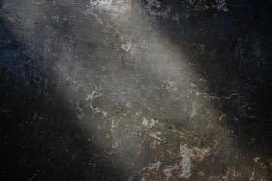 Alte Zementwand Textur Hintergrund Licht ausgesetzt foto
