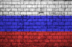 Russland-Flagge ist auf eine alte Mauer gemalt foto