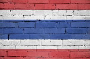 Thailand-Flagge ist auf eine alte Mauer gemalt foto