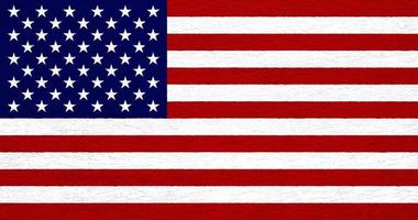 Flagge der Vereinigten Staaten von Amerika auf einer Zementwandstruktur. foto