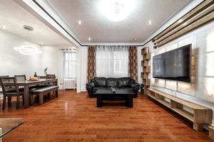 Moderne, voll möblierte High-End-Luxuswohnung in Montreal mit fertigem Keller, Schlafzimmern, Wäscherei, Küche, Hinterhof und Wohnzimmer foto