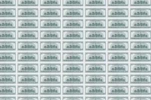 100 US-Dollar-Scheine, die im Geldproduktionsförderer gedruckt wurden. Collage aus vielen Rechnungen. Konzept der Währungsabwertung foto
