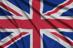 die großbritannien-flagge ist auf einem sportstoff mit vielen falten abgebildet. Sportteam-Banner foto