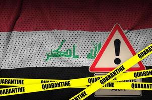 irak-flagge und covid-19-quarantäneband. Coronavirus oder 2019-ncov-Virus foto