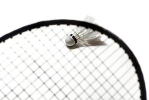 Badmintonschläger und Federball foto
