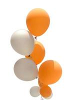 Gruppe von orange und weißen Luftballons foto
