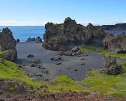 Island schwarzer Sandstrand Reynisfjara foto