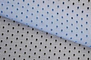 blaues Mesh-Sportbekleidungsstoff-Textil-Hintergrundmuster foto