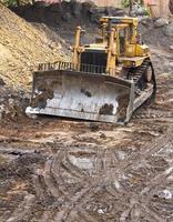 Bulldozer-Maschine vor Ort foto