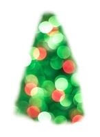grüne weihnachtslichter tannenbaum bokeh - ein heller bokeh-hintergrund, der durch weihnachtslichter erzeugt wird foto