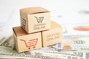 online-shopping, einkaufswagenbox mit geld, import export, finanzhandel. foto